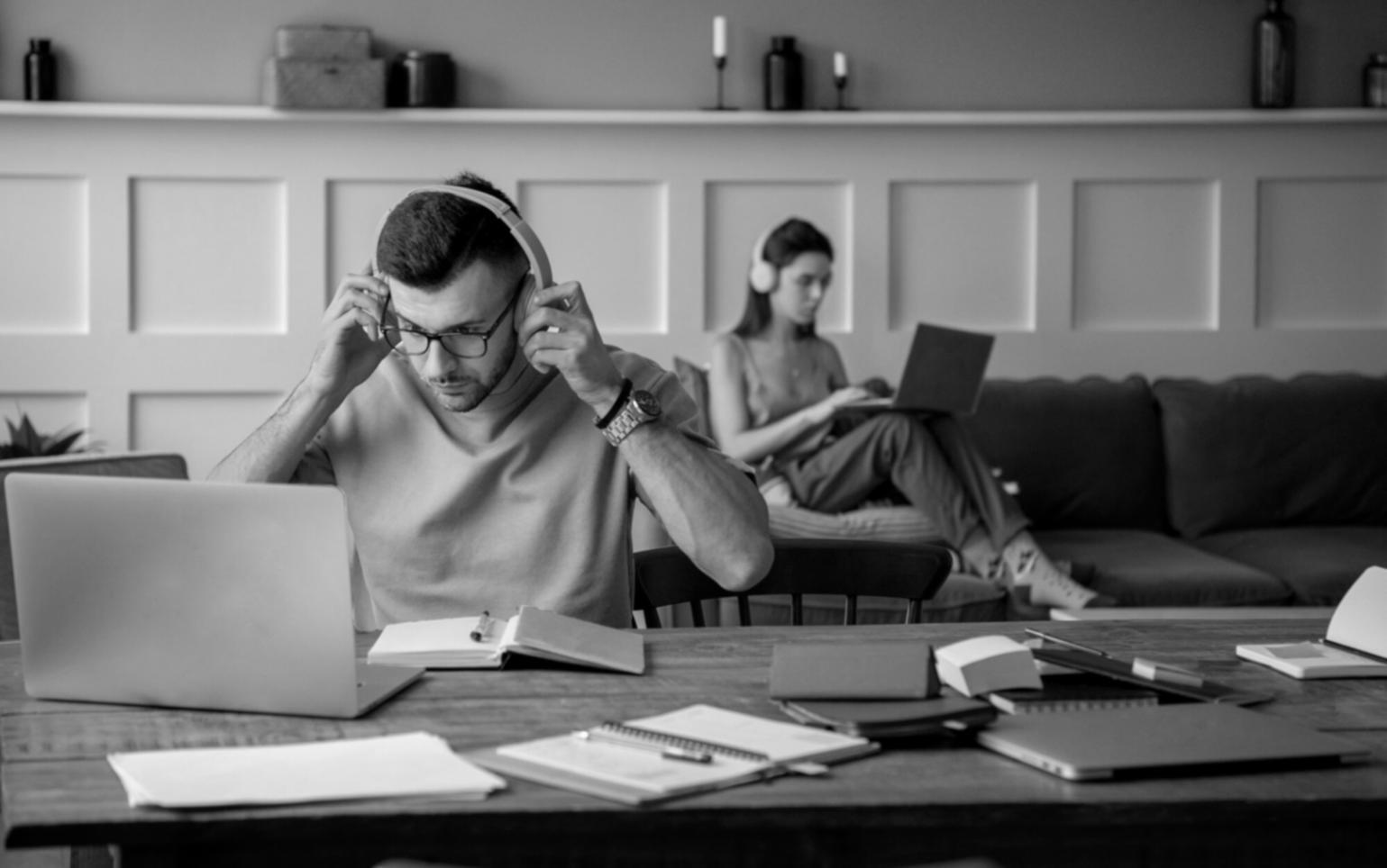 Family discussing finances together at kitchen table